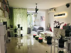 雨花集美容瘦身养生店的logo