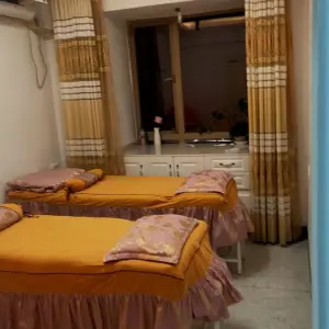 自强盲人按摩的logo