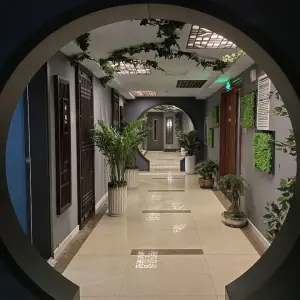 惠畅影院足道的logo