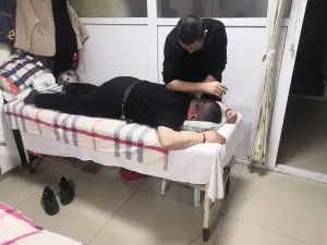 红和楼盲人推拿中心的logo