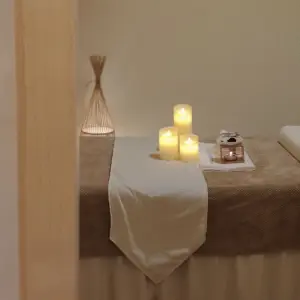 喜沐日式spa的logo