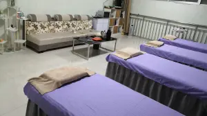 华阳推拿正骨瘦身塑形的logo