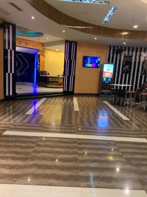 酷麦KTV（黄江店）的logo