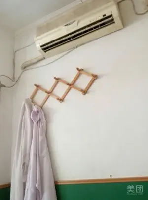 顺飞盲人按摩的logo