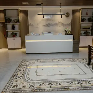 仟佰指沐足采耳会馆的logo