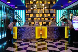 美乐迪量贩KTV（牟平新装店）的logo