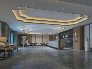 康友·贵人港影院足道的logo