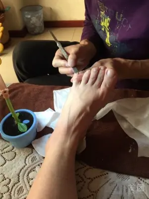 爱足康修脚堂的logo