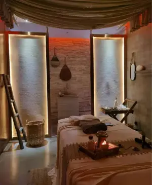 迁之喜头疗SPA的logo