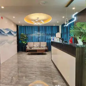 曼古里养生会所的logo